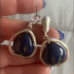Blue and silver tone fashion earrings.